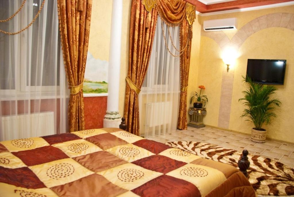 Coliseum Hotell Khmelʼnytsʼkyy Rom bilde